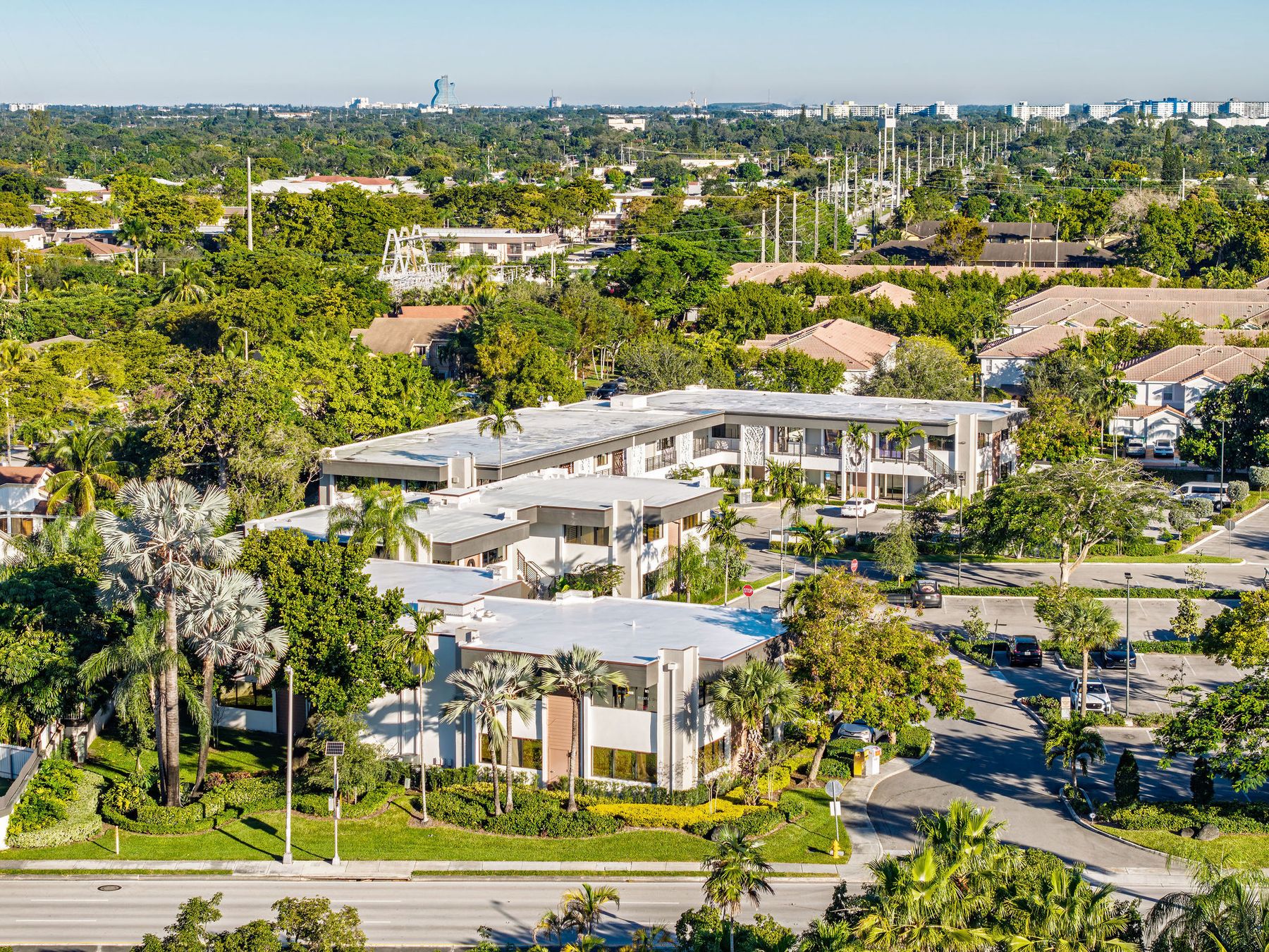 Aerial view of the office park at golden hour with the Miami skyline